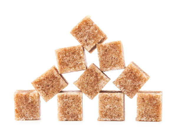 Brown cane sugar cubes isolated on white background — Stock Photo, Image