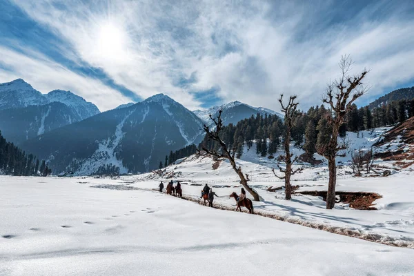 Tourists Enjoying Horse Riding Aru Valley Winter Scene Pahalgam Kashmir Royalty Free Stock Images
