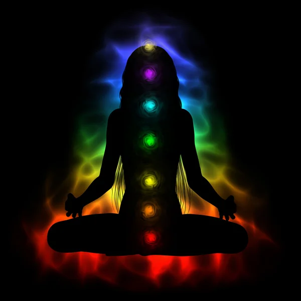 Silhouette of long hair woman meditating - colored chakras — Stock Photo, Image