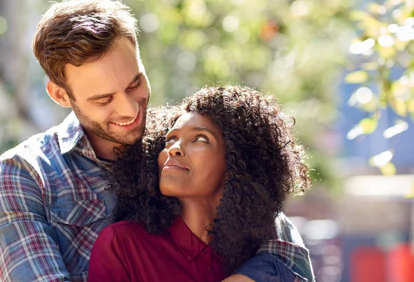 Diverse Young Couple Lovingly Looking Each Other Eyes While Standing — Stock Photo, Image