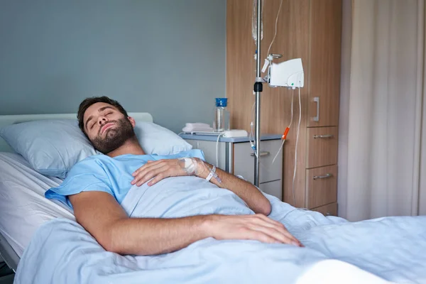 Young Man Lying Fast Asleep Bed Hospital Room Attached Intravenous — Stock Photo, Image