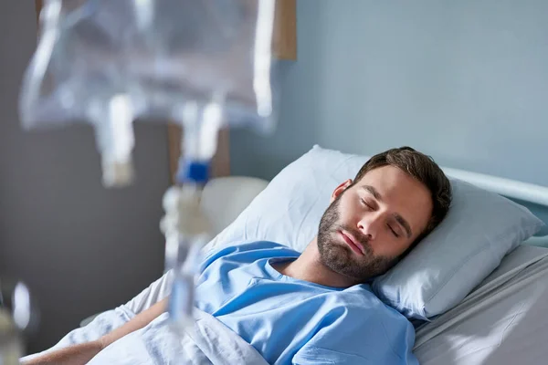 Sick Young Man Lying Asleep Bed Hospital Receiving Intravenous Drip — Stock Photo, Image
