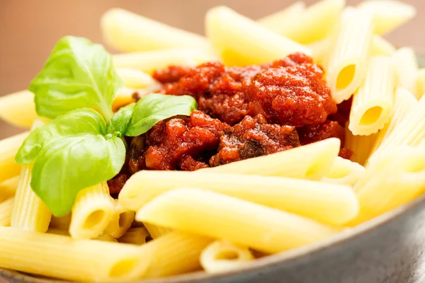 Penne pasta with bolognese sauce — Stock Photo, Image