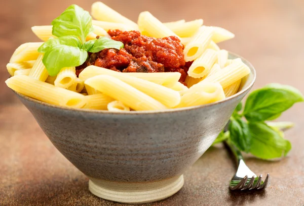 Penne pasta with tomato bolognese — Stock Photo, Image