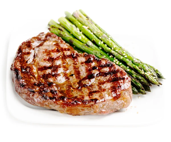 Barbecue grilled beef steak with asparagus — Stock Photo, Image