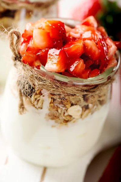 Strawberries desert with cream and cereals — Stock Photo, Image