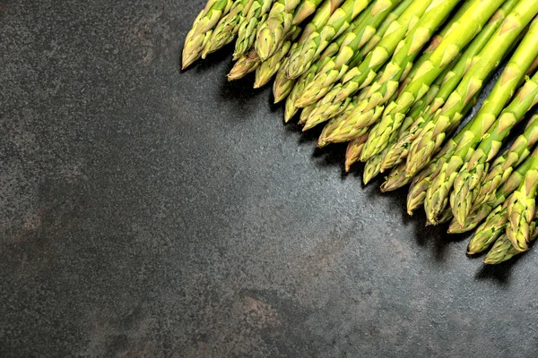 Asparagus on table with copy space — Stock Photo, Image