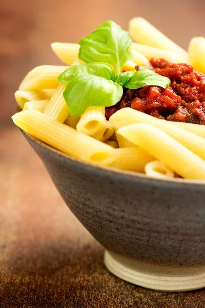 Penne pasta with a tomato bolognese beef sauce — Stock Photo, Image