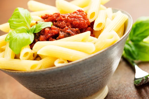 Penne pasta with beef sauce — Stock Photo, Image