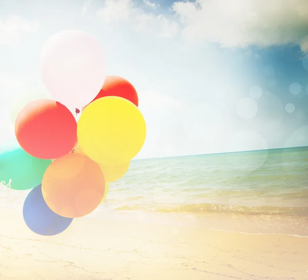 Balloons on the beach — Stock Photo, Image