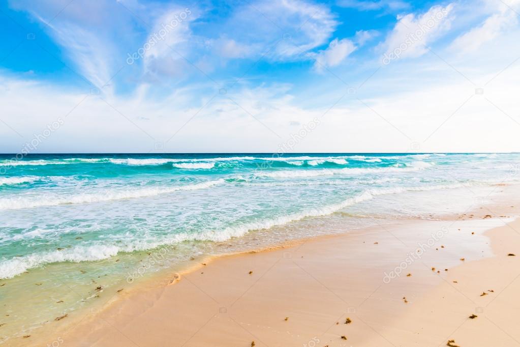 Ocean waves, white sand beach, Caribbean sea