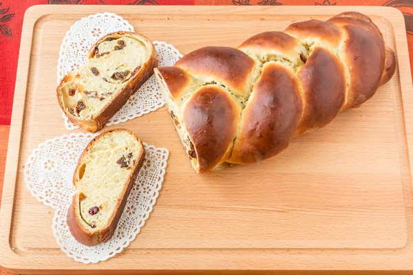 Braided bread with fruits and nuts. — Stock Photo, Image