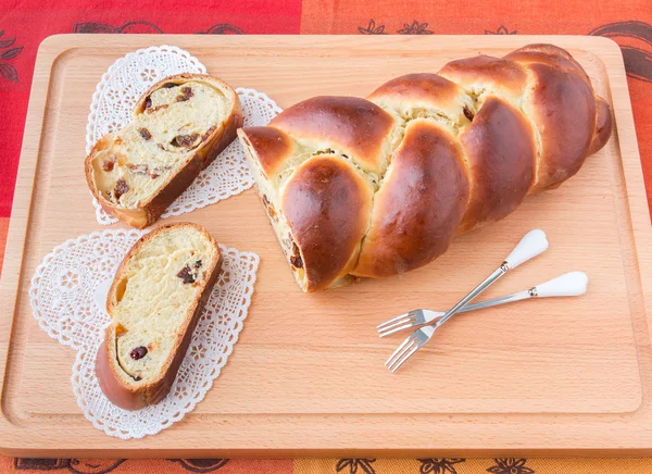Braided bread with fruits and nuts. — Stock Photo, Image