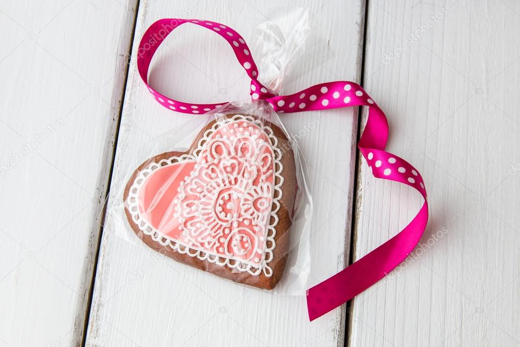 Heart shaped cookie decorated with ornaments