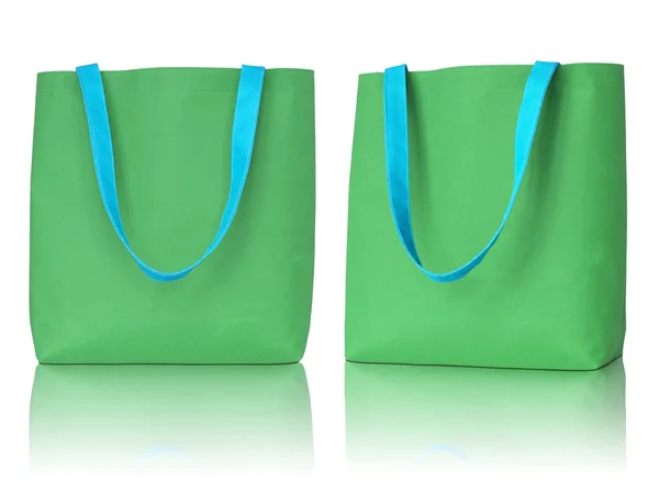 Beyaz zemin üzerine yeşil alışveriş kumaş çanta — Stok fotoğraf