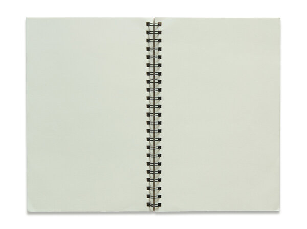 blank spiral notebook isolated on white background 