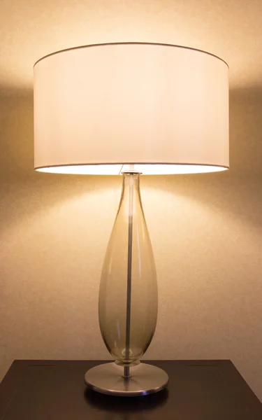 Table lamp on desk — Stock Photo, Image