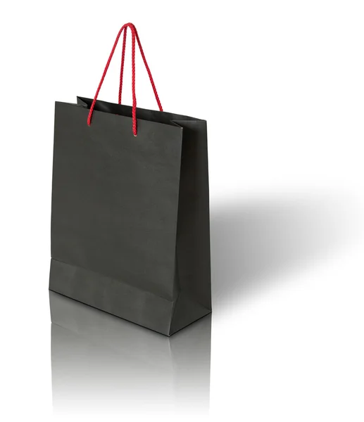 Black paper bag on white background — Stock Photo, Image