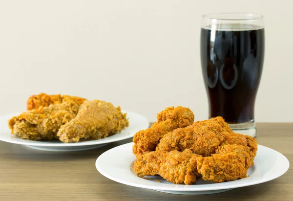 Fried chicken with cola on dining table — Stock Photo, Image