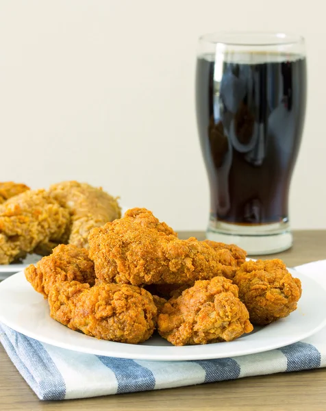 Fried chicken with cola on dining table — Stock Photo, Image