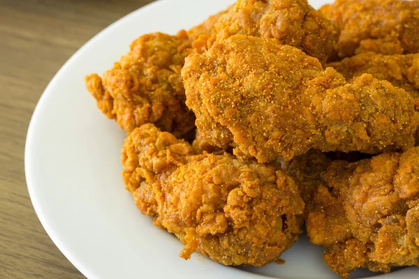 Fried chicken on white plate — Stock Photo, Image