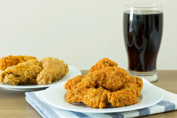 Fried chicken with cola on dining table — Stock Photo, Image