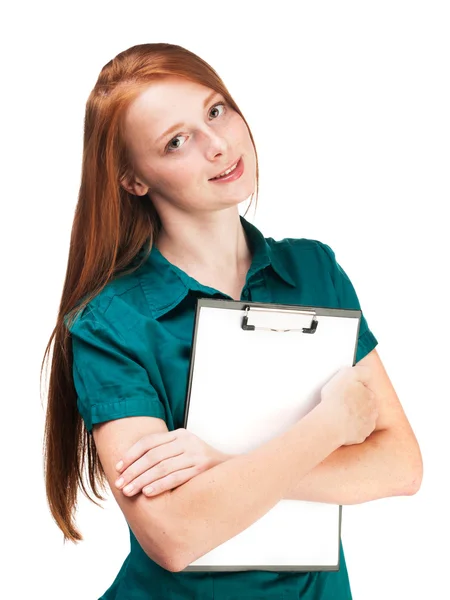 Mooi roodharige meisje houden een bord geïsoleerd op witte achterzijde — Stockfoto