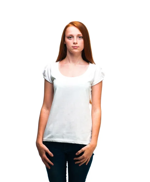 白い t シャツで美しい少女。白い背景で隔離 ロイヤリティフリーのストック写真