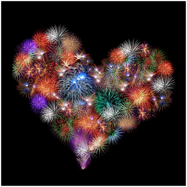 A group of exploding fireworks shaped like a heart. — Stock Photo, Image