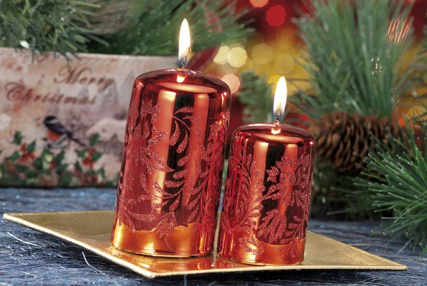 Closeup of colored Christmas candles on colored background — Stock Photo, Image