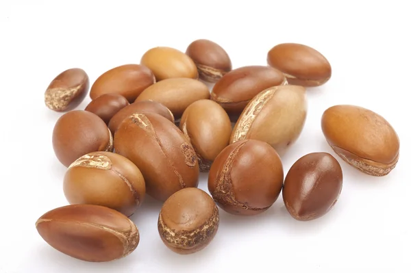 Seeds of argan on white,a close up on white background — Stock Photo, Image