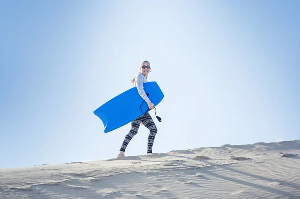 Young woman boarding — Stock Photo, Image