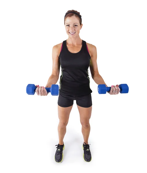 Mulher fitness levantando pesos livres em um fundo branco — Fotografia de Stock