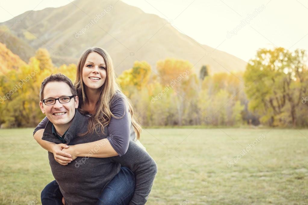 Outdoor portrait of a beautiful middle aged couple.