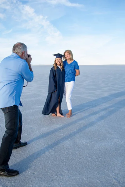 Man Taking Photo His Wife Graduated Daughter Salt Flat Desert — Stock Photo, Image