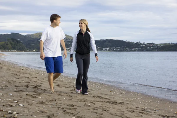 Two friends talking and walking together — Stock Photo, Image