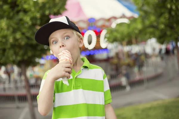 Boy licking  ice cream — Stock Photo, Image