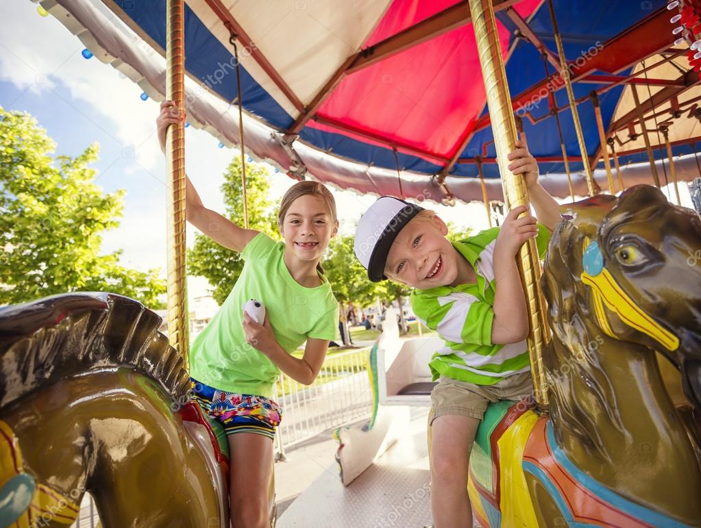 Kids Riding On Carousel Stock Photo By yobro10 77036585 kids-riding-on-carousel-stock-photo-by-yobro10-77036585
