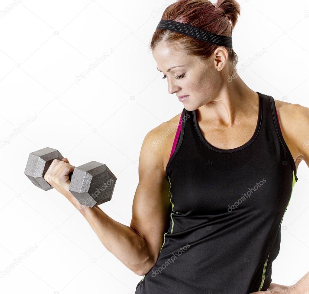 woman lifting dumbbell weight
