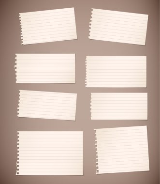 Kahverengi zemin üzerinde yırtık beyaz çizgili Not kağıt parçaları