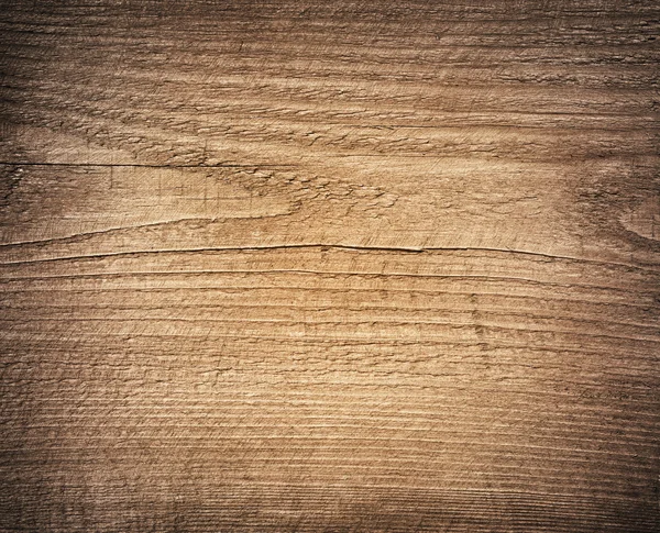 Tagliere in legno marrone chiaro graffiato. Struttura del legno — Foto Stock