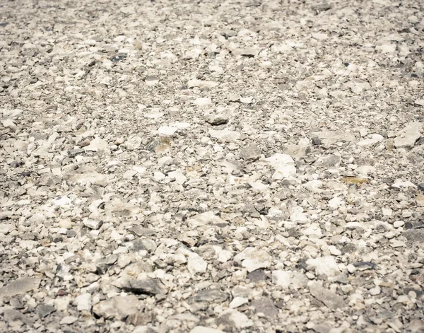 Фон камней, гравийная дорога — стоковое фото