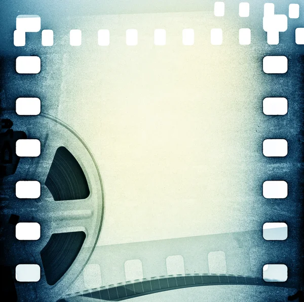 Old motion picture film reel with film strip. — Stock Photo, Image