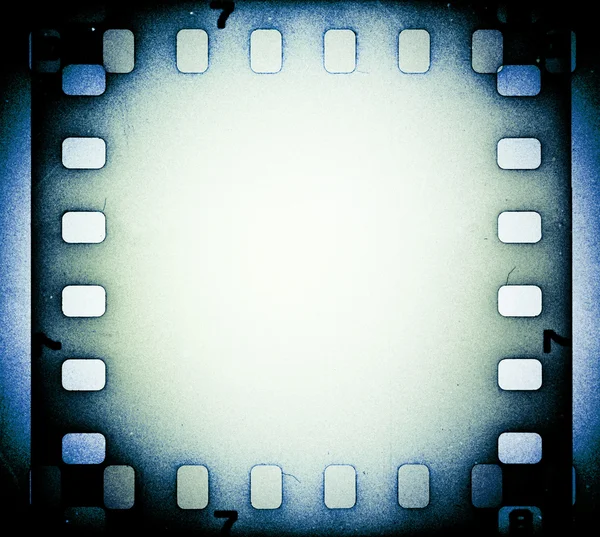 Grunge scratched film strip background. — Stock Photo, Image