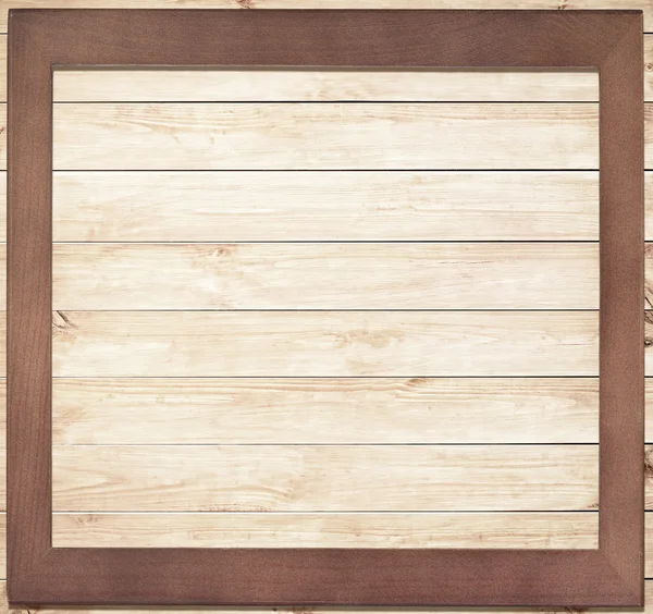 Square wooden frame on wood background — Stock Photo, Image