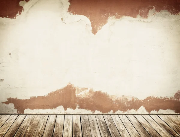 Concrete wall with grunge wooden floor. — Stock Photo, Image