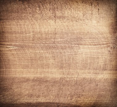 Kahverengi çizik tahta kesme tahtası.