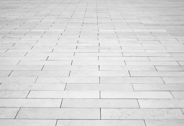 Серая кирпичная каменная дорога. Легкий тротуар, текстура тротуара — стоковое фото