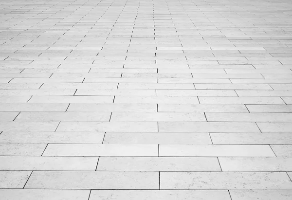 Grey brick stone street road. Light sidewalk, pavement texture — Stock Photo, Image