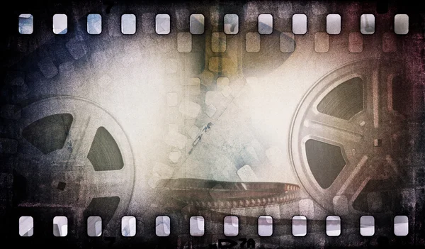 Motion picture film reel with photostrip — Stock Photo, Image